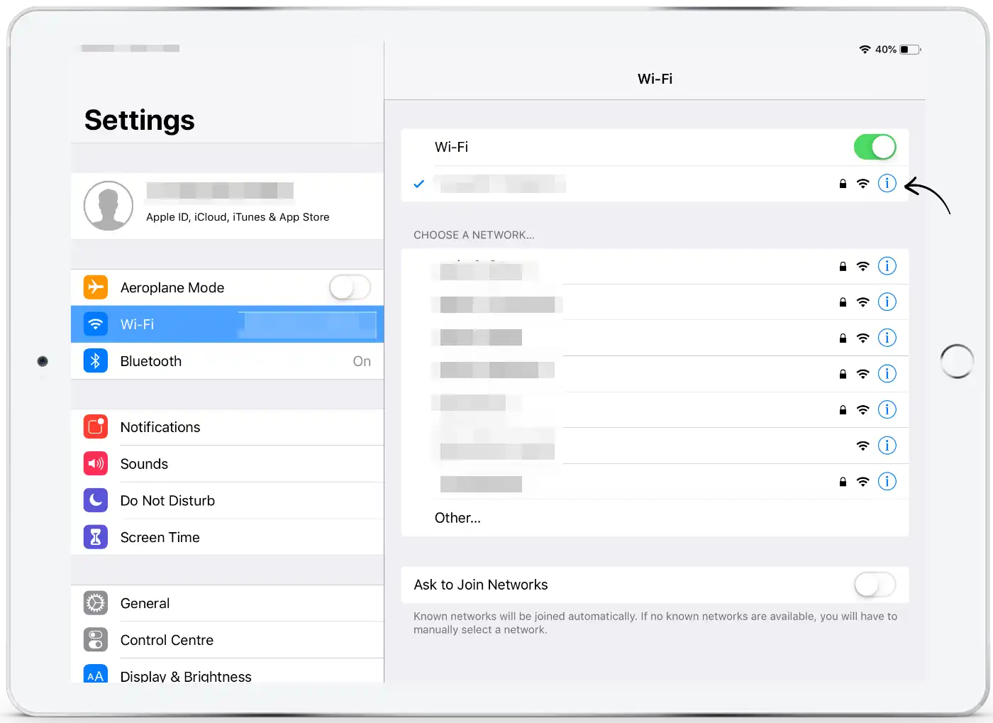 Real iPad Wi-Fi settings screen showing the information button beside the connected network