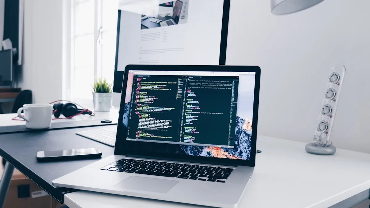 Developer workspace with laptop code editor